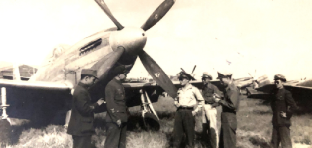 Cheng Sung-ting (second from right) and other military leaders inspect a P-51 fighter plane in Nanking shortly after the seat of the Nationalist government relocated to the city, ca. 1946. 