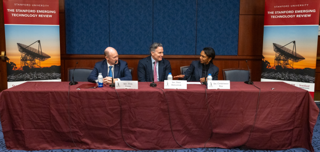 Director Rice, Senators Coons, and McCormick in conversation during their panel session.