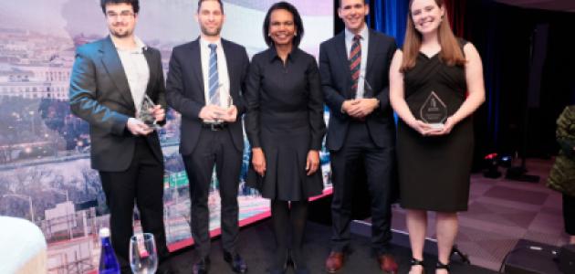 Winners of the 2025 HISPBC Student Essay Competition stand with Hoover Institution Director Condoleezza Rice on February 22, 2026. (Eric Draper)