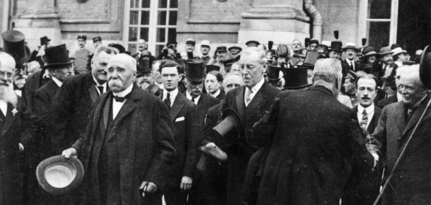 1919: French prime minister Georges Clemenceau (1841 - 1929) (L), US president Woodrow Wilson (1856 - 1924) (C) and British prime minister David Lloyd George (1863 - 1945) attend negotiations for the Treaty of Versailles. (Photo by Hulton Archive/Getty Images)
