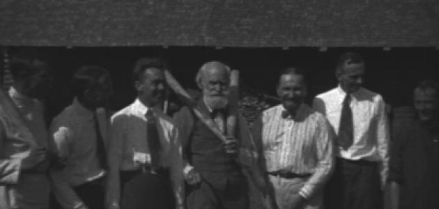 Ivan Pavlov and associates posing for the camera during a brief pause from their game of gorodki.