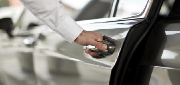 Man opening a car door