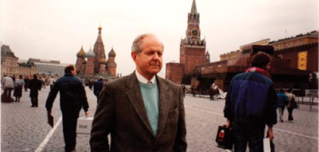 Robert Conquest and a television crew prepare for a scene in the documentary Red Empire
