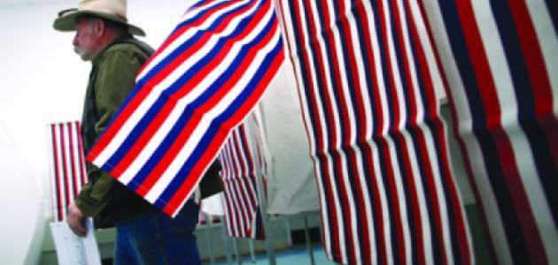 man leaves voting booth