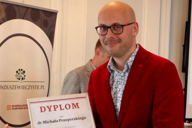 Photograph of Dr. Michał Przeperski receiving his dyploma
