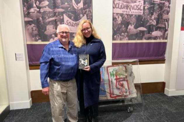 Richard Brown standing with Rebecca Donner in Hoover Tower Gallery