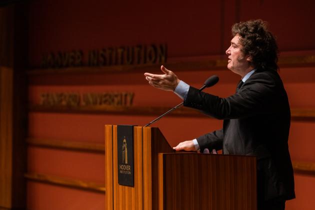 Argentine President Javier Milei gestures at the podium as he speaks in Hauck Auditorium on May 29, 2024.
