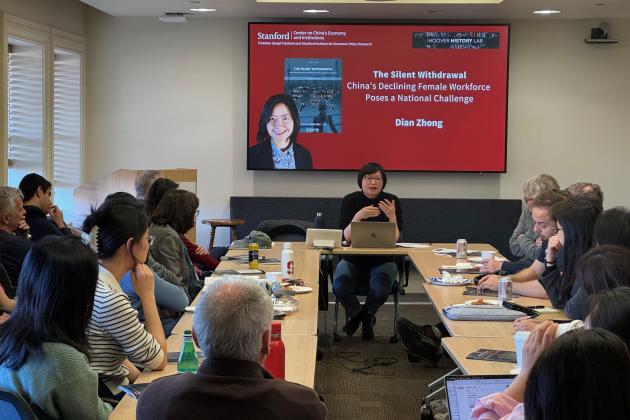 Dian Zhong speaking at an event