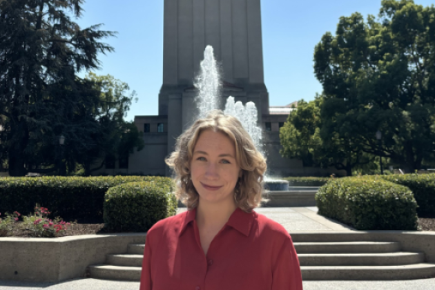 Jenna Mollerus in front of the Hoover Tower