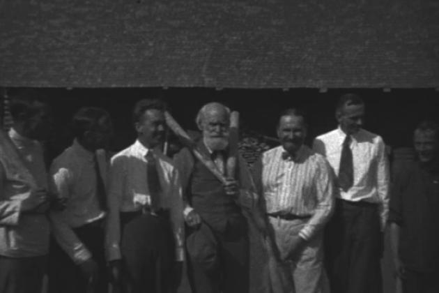 Ivan Pavlov and associates posing for the camera during a brief pause from their game of gorodki.