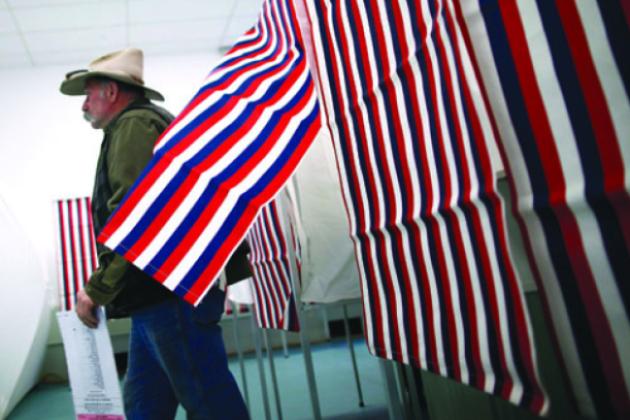 man leaves voting booth