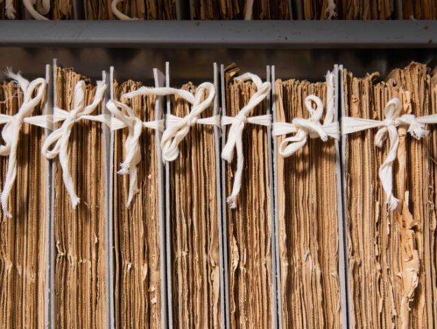 Cotton tied newspapers