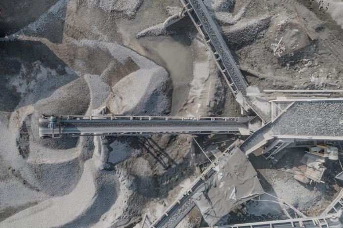 Aerial view of crushed stone quarry machine in a construction material factory stock photo