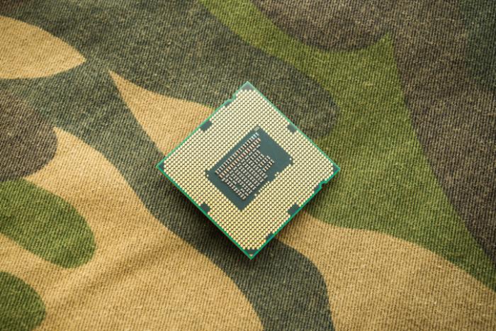 computer chip on camo background