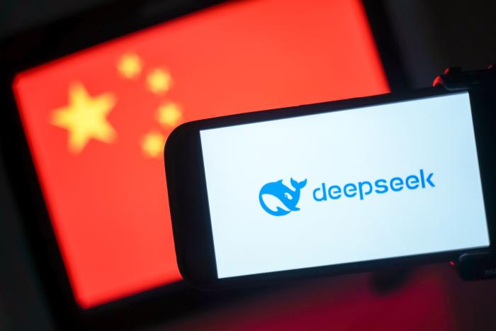 DeepSeek logo in front of a Chinese flag