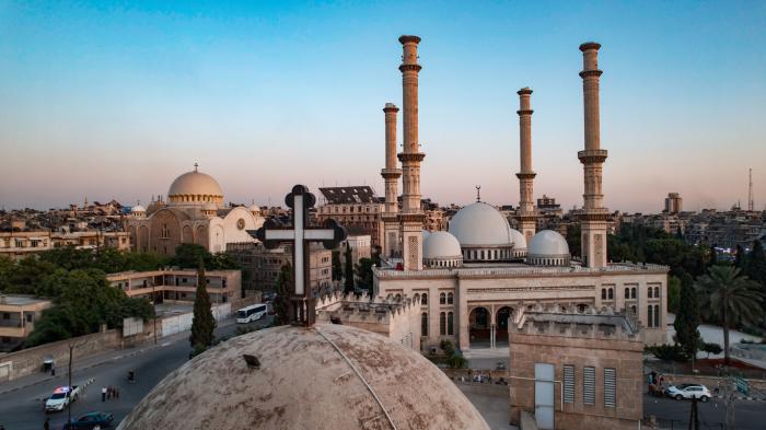 Coexistence between sects in Syria. stock photo