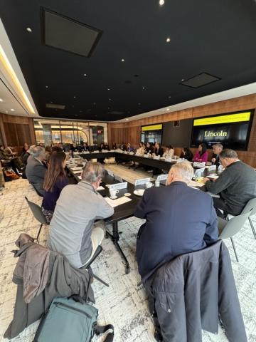 Participants in a day-long symposium on the policy implications of AI are seen in Hoover’s Washington, D.C. offices on December 9, 2025.