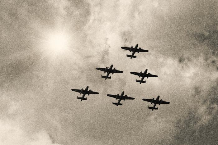 WW2 Mitchell B-25 Medium Bombers flying in V-Formation stock photo
