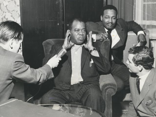 Louis Armstrong visits with Radio Liberty reporters