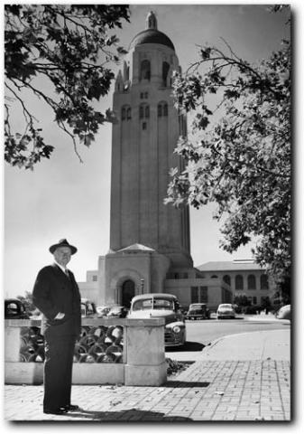 Former president Herbert Hoover poses with his namesake tower in August 1951.