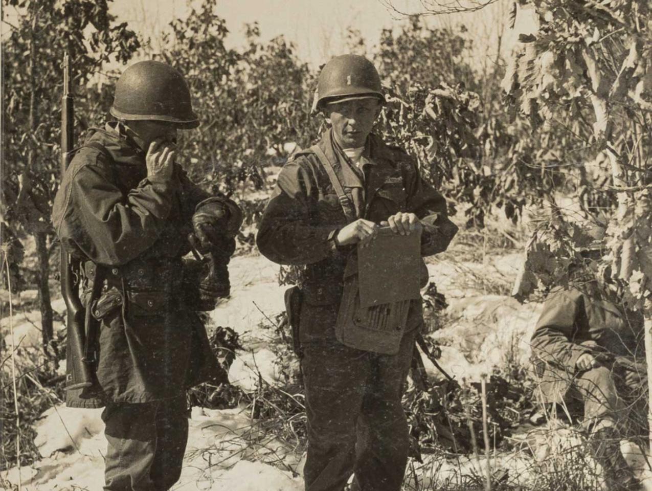 Rasula - sepia toned photo of 2 soldiers in the field