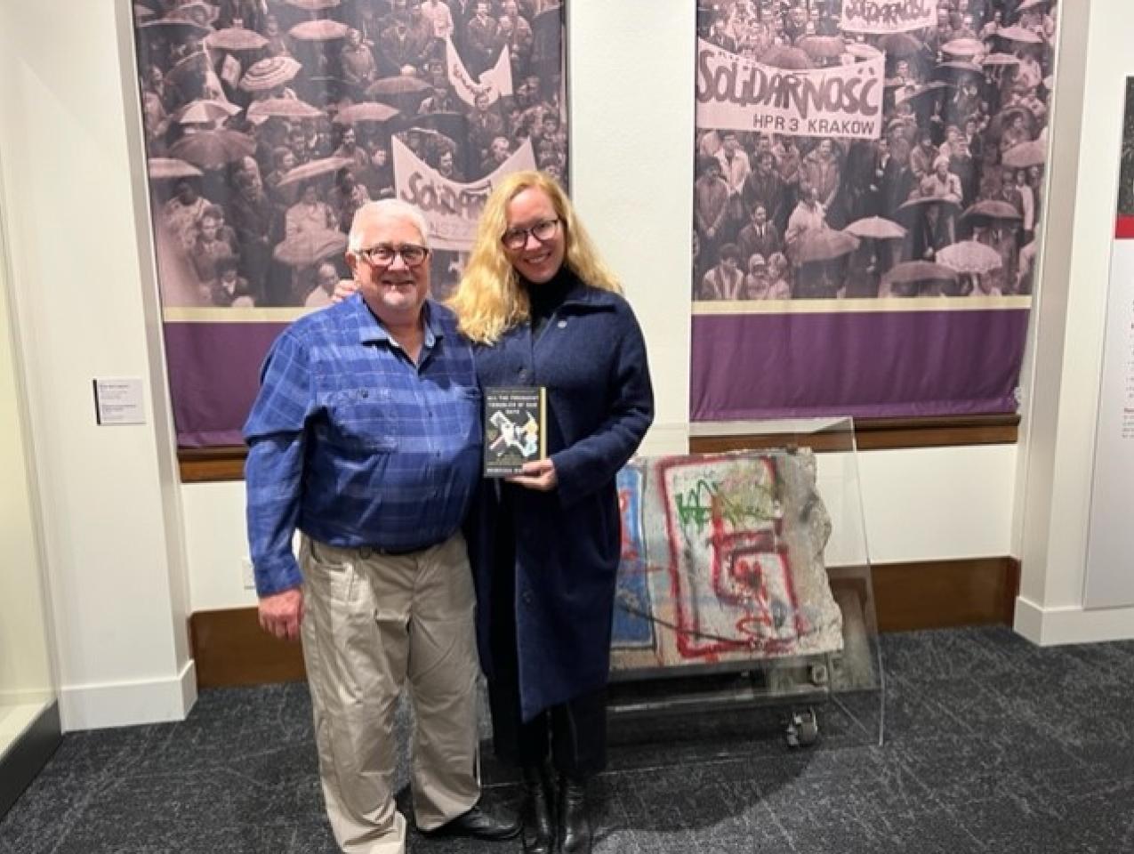 Richard Brown standing with Rebecca Donner in Hoover Tower Gallery