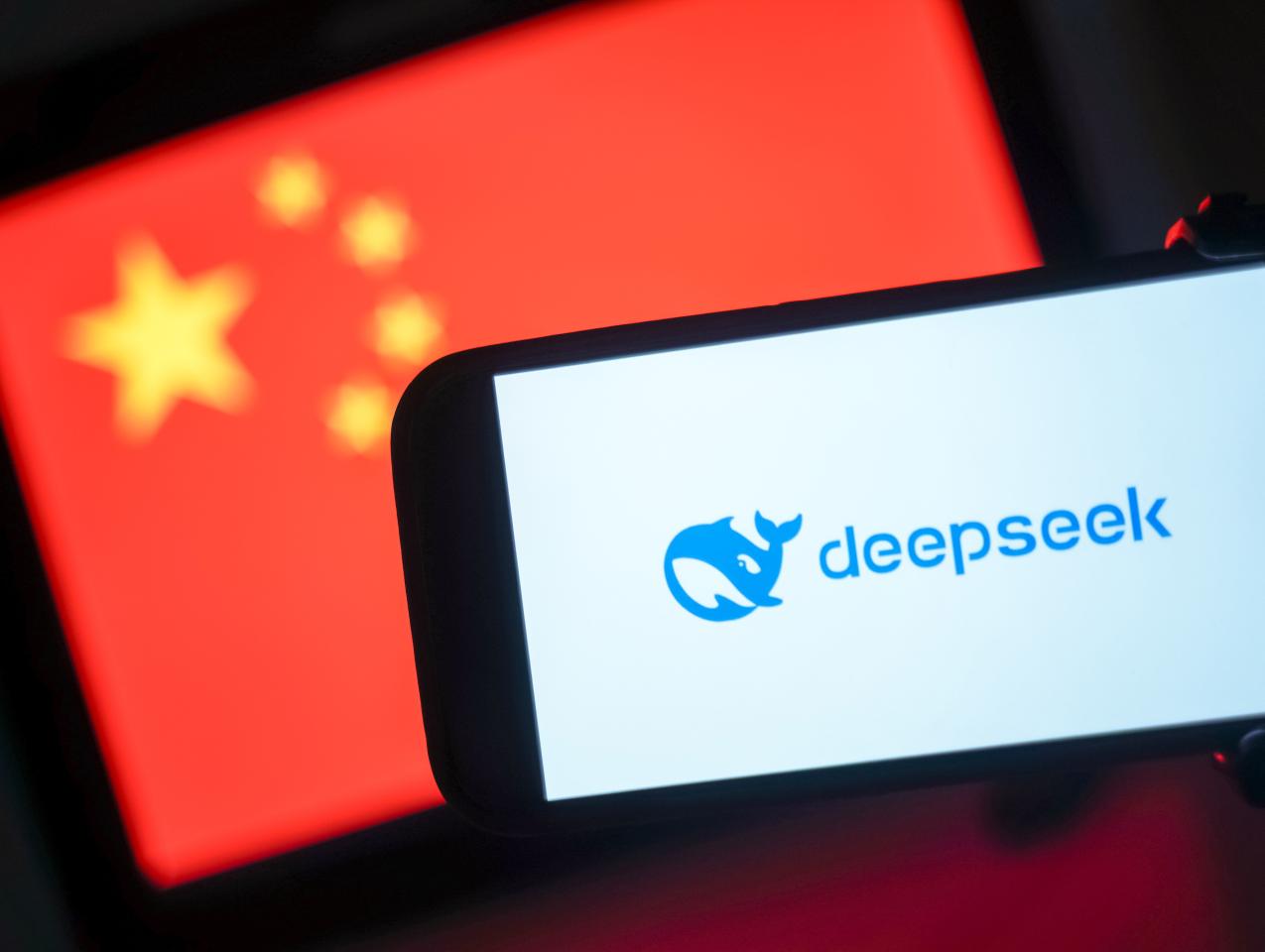 DeepSeek logo in front of a Chinese flag