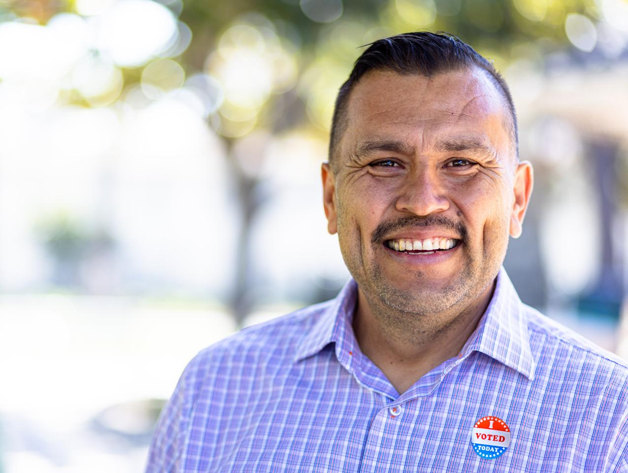 Mexican Man with I voted Sticker stock photo
