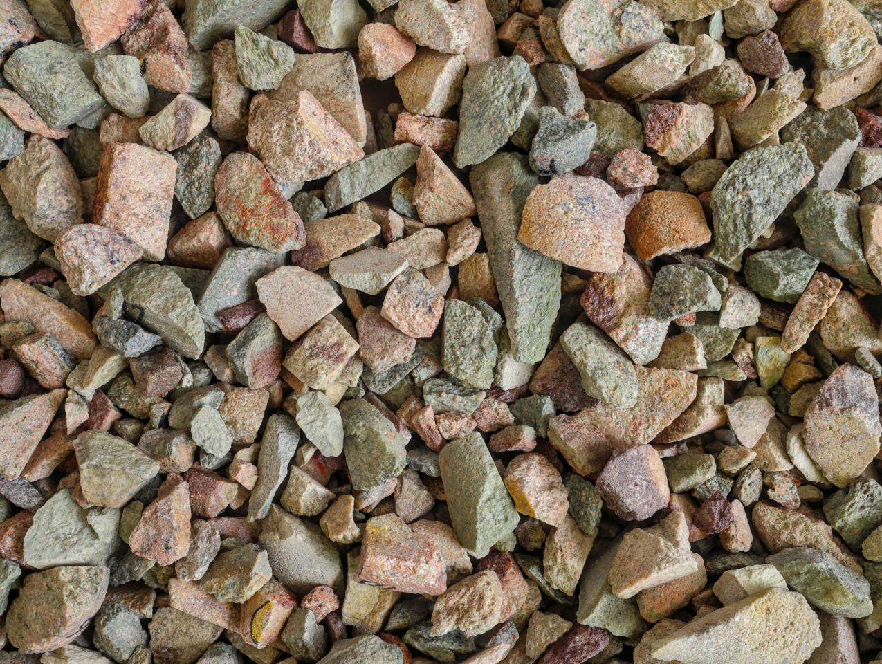 Rare earth (earths) element ore. Critical minerals, used in production of permanent magnets, aerospace alloys, specialty glass, electronic equipment, electric motors of hybrid and electric vehicles (EV), wind turbine generators. Background concept. - stock photo