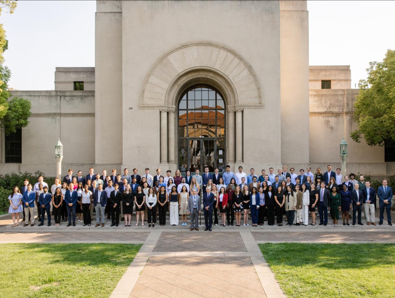 Students who participated in the 2025 Hoover Institution Summer Policy Boot Camp stand before Hoover Tower on August 10, 2025. (Patrick Beaudouin)
