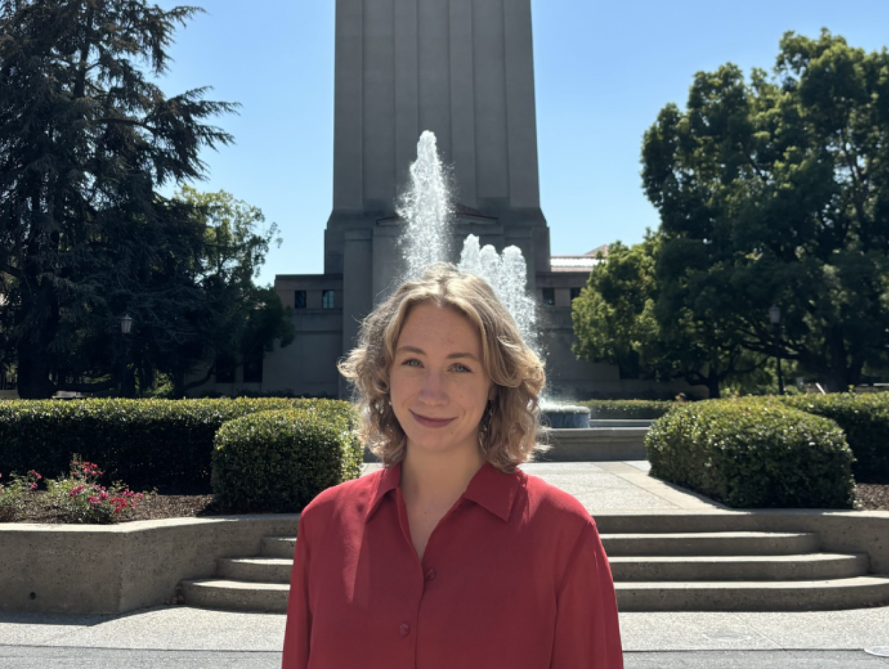 Jenna Mollerus in front of the Hoover Tower
