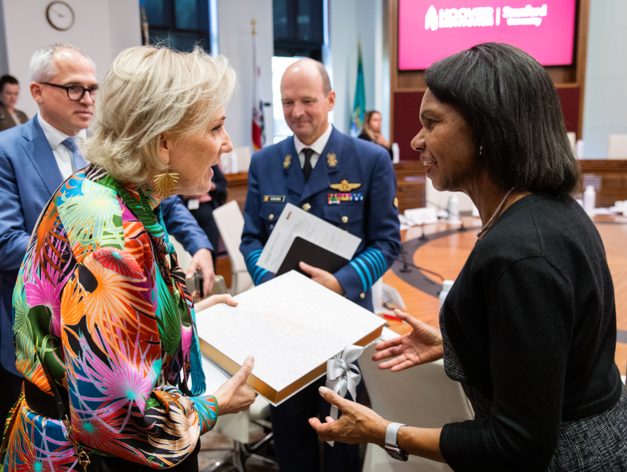 Hoover Institution Director Condoleezza Rice and Her Imperial and Royal Highness Princess Astrid of Belgium exchange a gift in the Annenberg Conference Room on October 7, 2025. (Patrick Beaudouin)