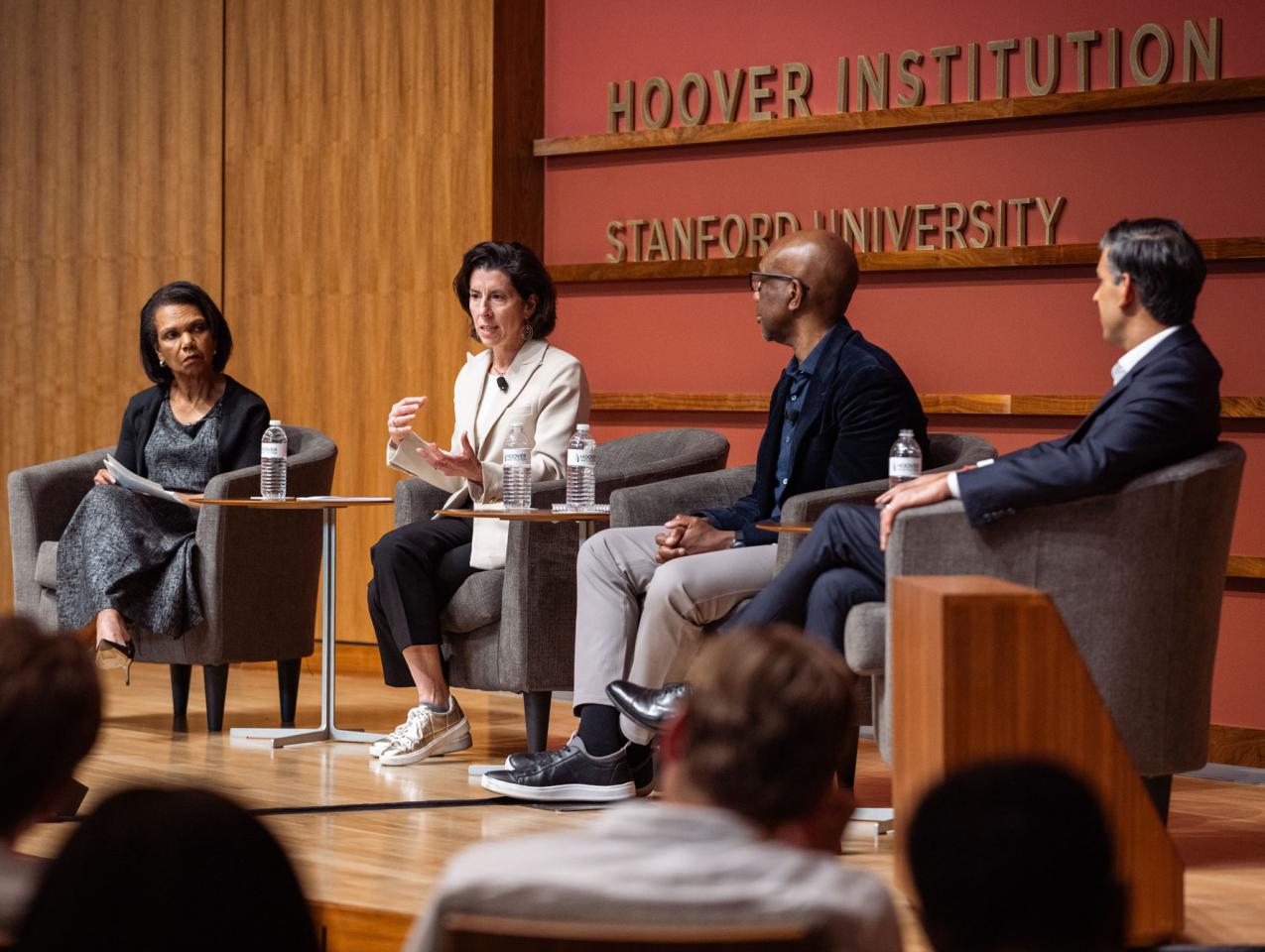 Hoover Institution Director Condoleezza Rice, Former US Commerce Secretary Gina Raimondo, Google-Alphabet executive James Manyika and Former UK Prime Minister and Hoover Distinguished Visiting Fellow Rishi Sunak are seen in Hauck Auditorium on March 17, 2026. (Patrick Beaudouin)