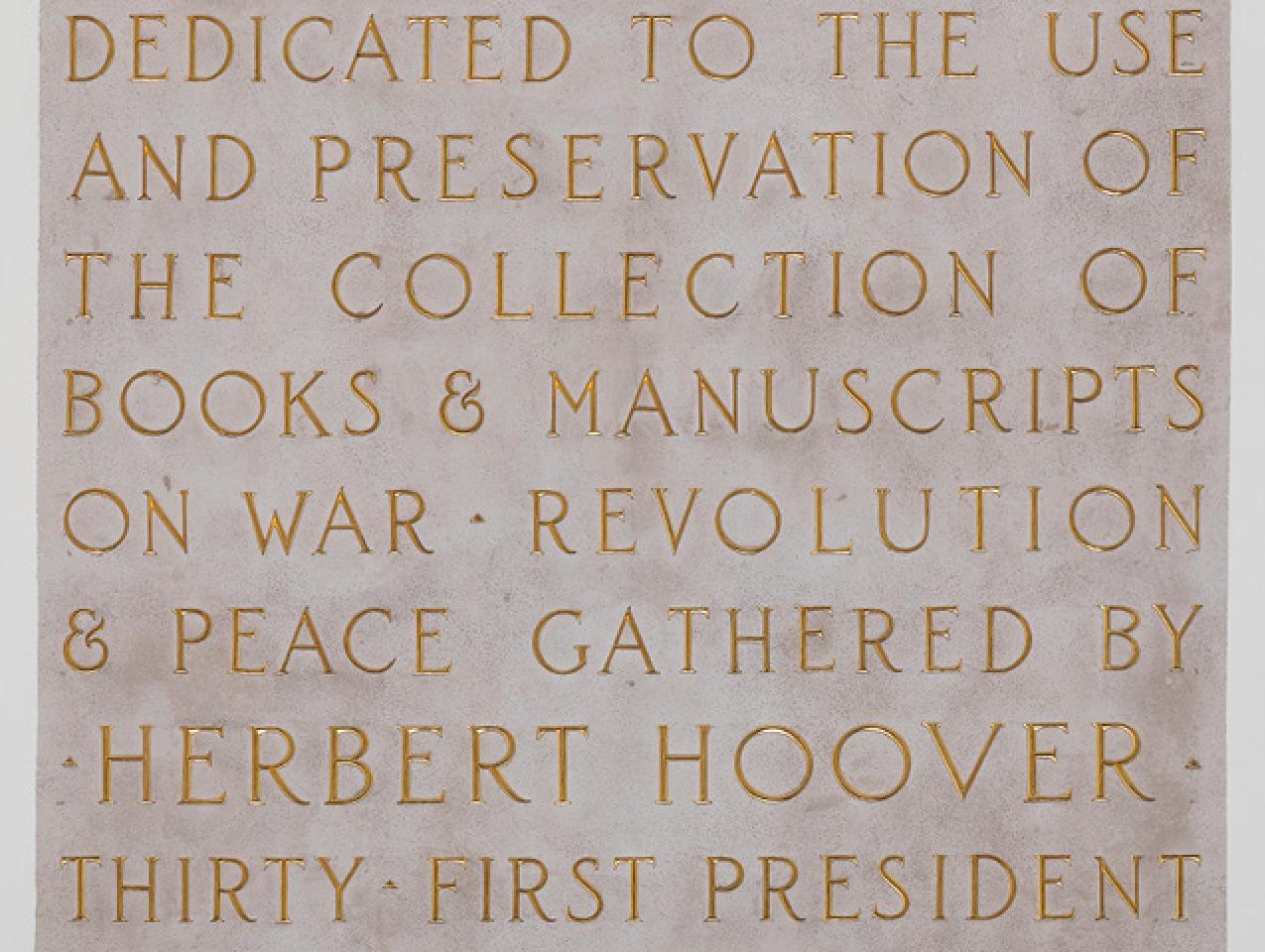 Inscription in Hoover Tower recognizing purpose of the Hoover Library & Archives collection