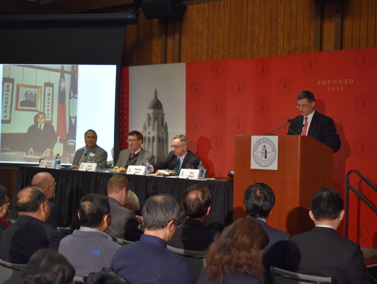 Hoover deputy director Eric Wakin (right) moderated the discussion.