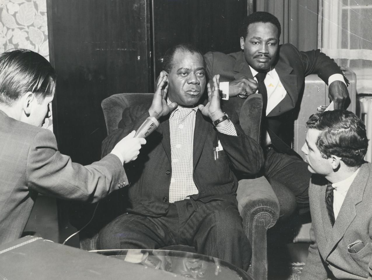 Louis Armstrong visits with Radio Liberty reporters