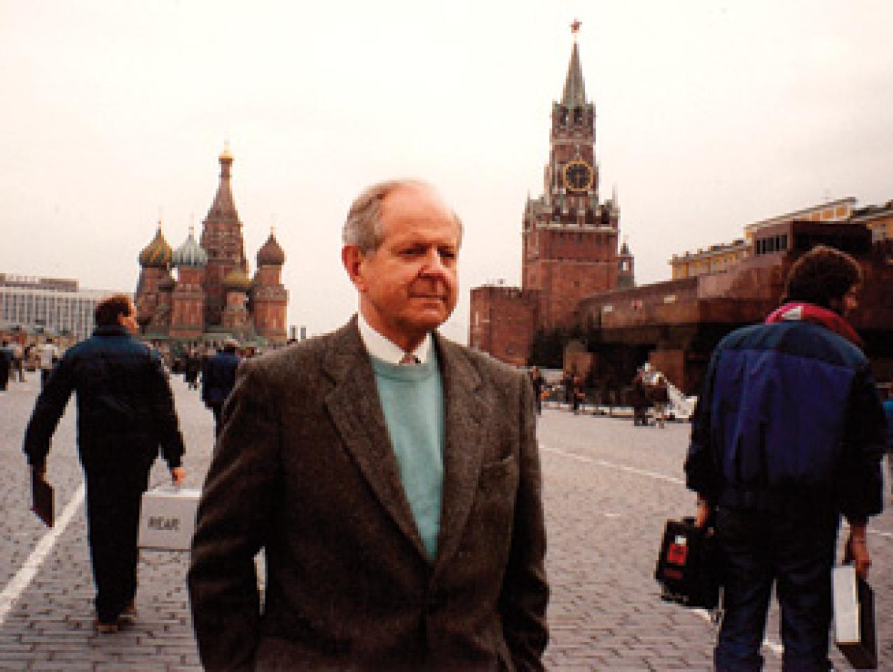 Robert Conquest and a television crew prepare for a scene in the documentary Red Empire