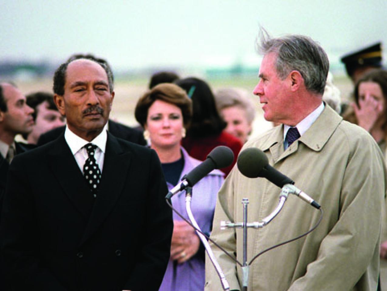 Egyptian President Anwar Sadat, left, arrives at Andrews Air Force Base in 1980