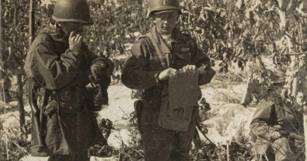 Rasula - sepia toned photo of 2 soldiers in the field