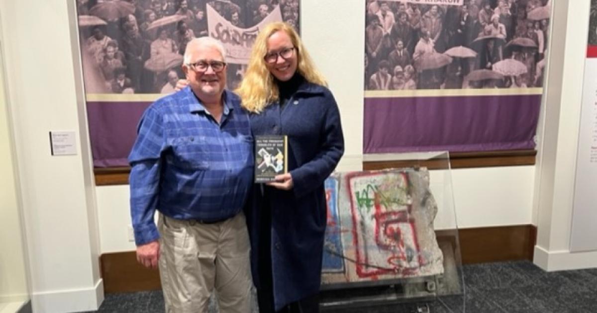 Richard Brown standing with Rebecca Donner in Hoover Tower Gallery