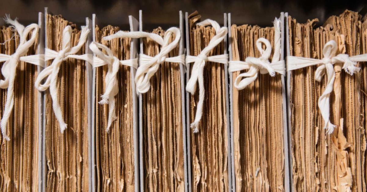 Cotton tied newspapers