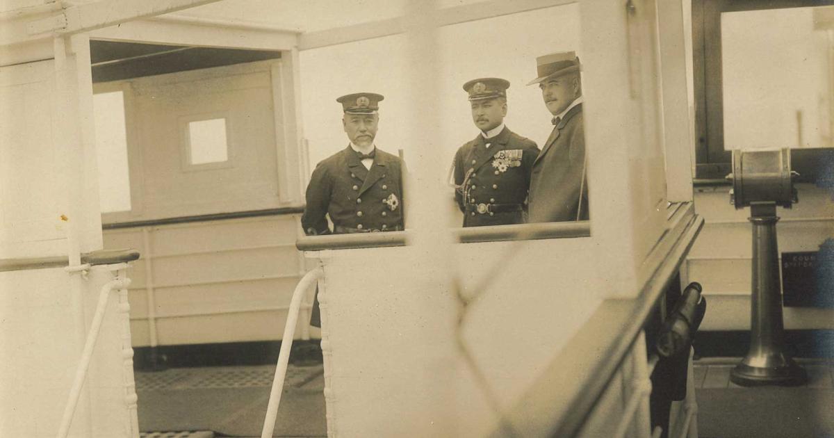 3 men standing on the deck of the Tanba Maru
