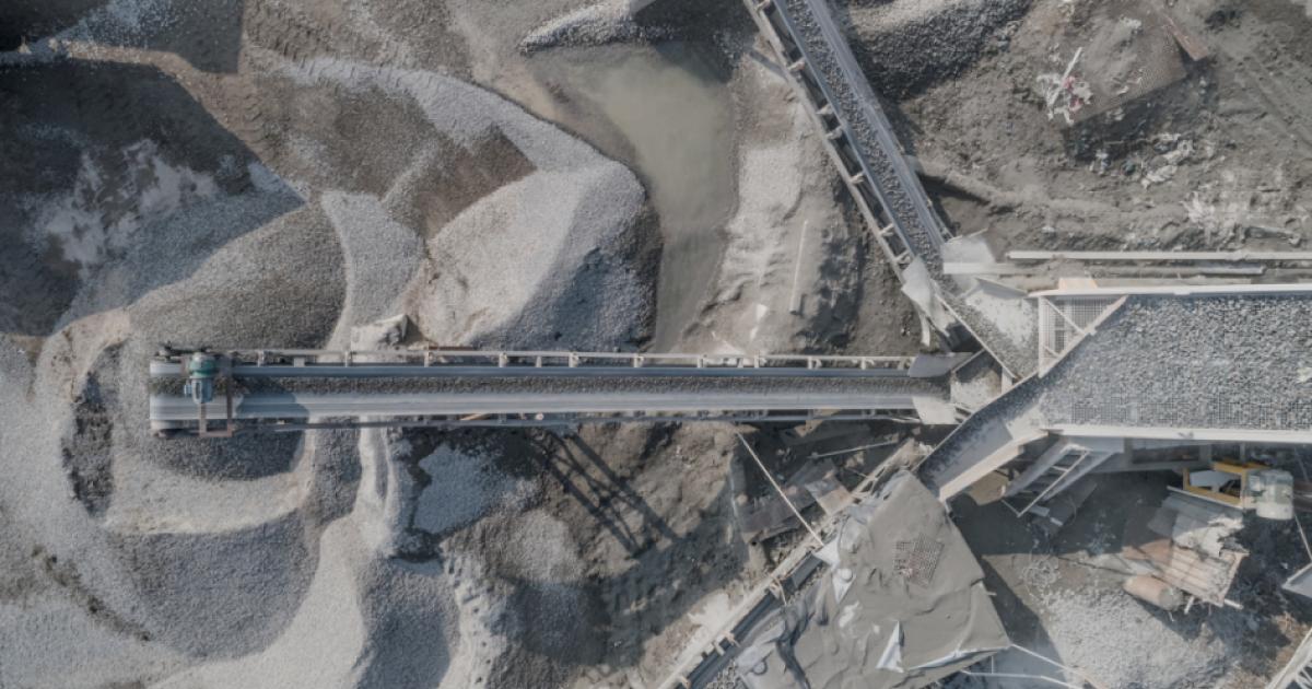 Aerial view of crushed stone quarry machine in a construction material factory stock photo