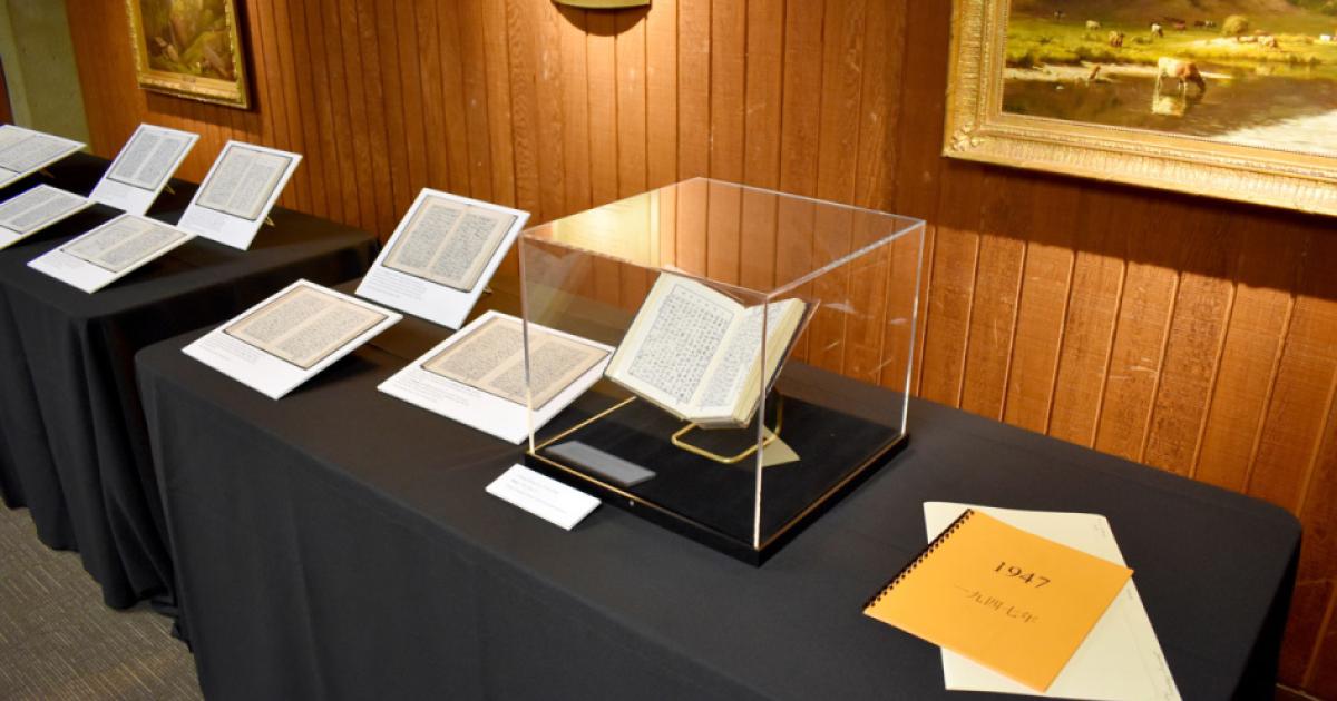 Exhibit of Chiang Ching-kuo diaries on a table with black tablecloth