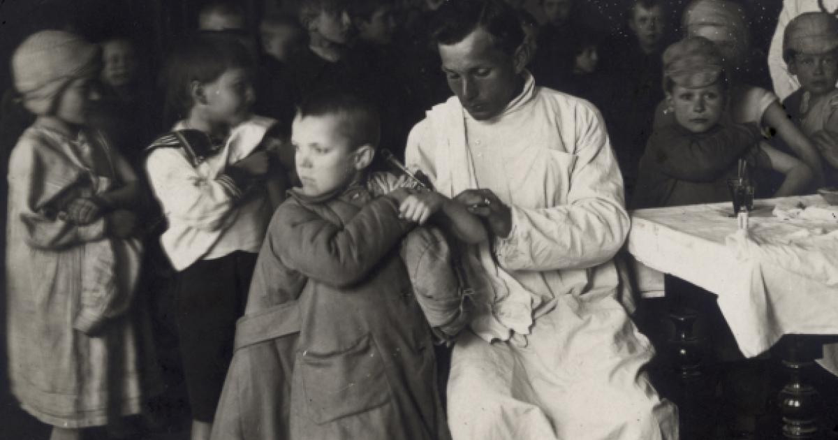 Black and white photograph of a vaccination clinic run by the ARA Russian Unit's medical program, circa 1922.