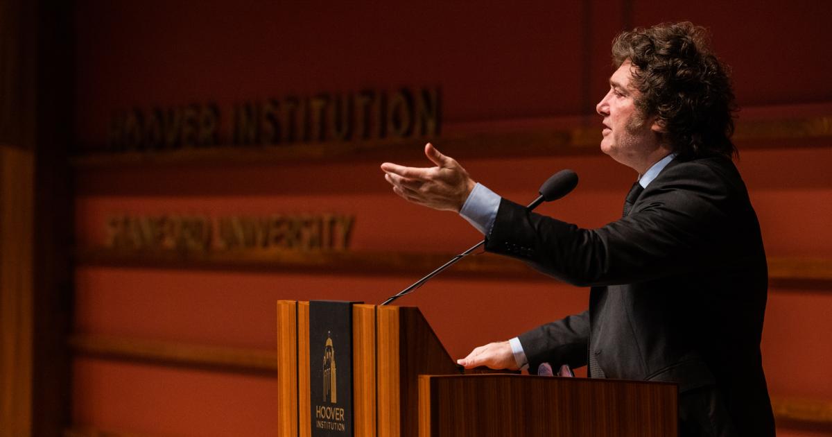 Argentine President Javier Milei gestures at the podium as he speaks in Hauck Auditorium on May 29, 2024.