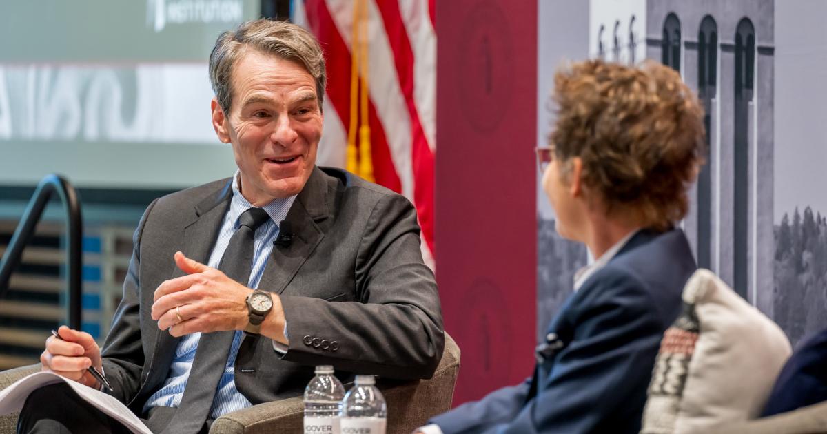 Senior Fellow John H. Cochrane speaks with SF Fed President and CEO Mary C. Daly in Shultz Auditorium on December 6, 2024. (Steve Castillo)