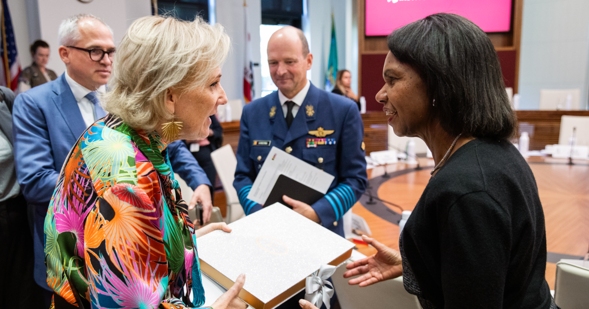 Hoover Institution Director Condoleezza Rice and Her Imperial and Royal Highness Princess Astrid of Belgium exchange a gift in the Annenberg Conference Room on October 7, 2025. (Patrick Beaudouin)