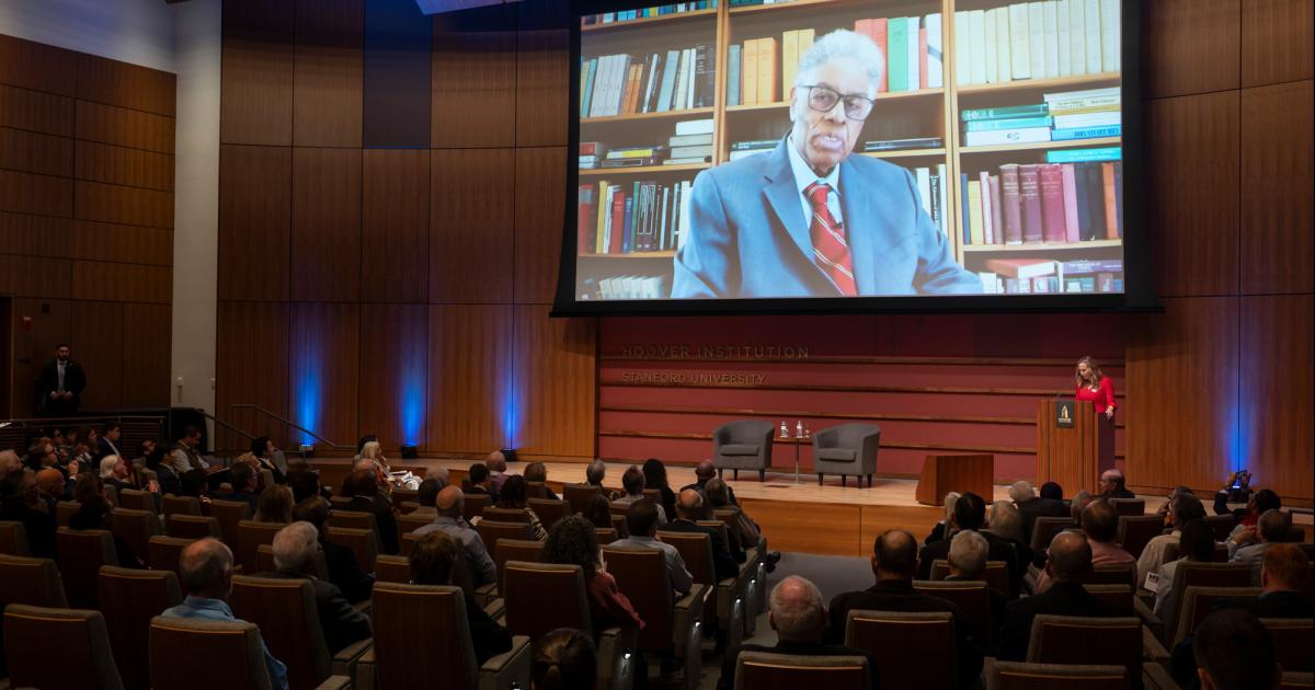 Thomas Sowell speaks on screen inside Hauck Auditorium at a celebration of his career on October 20, 2025. (Patrick Beaudouin)