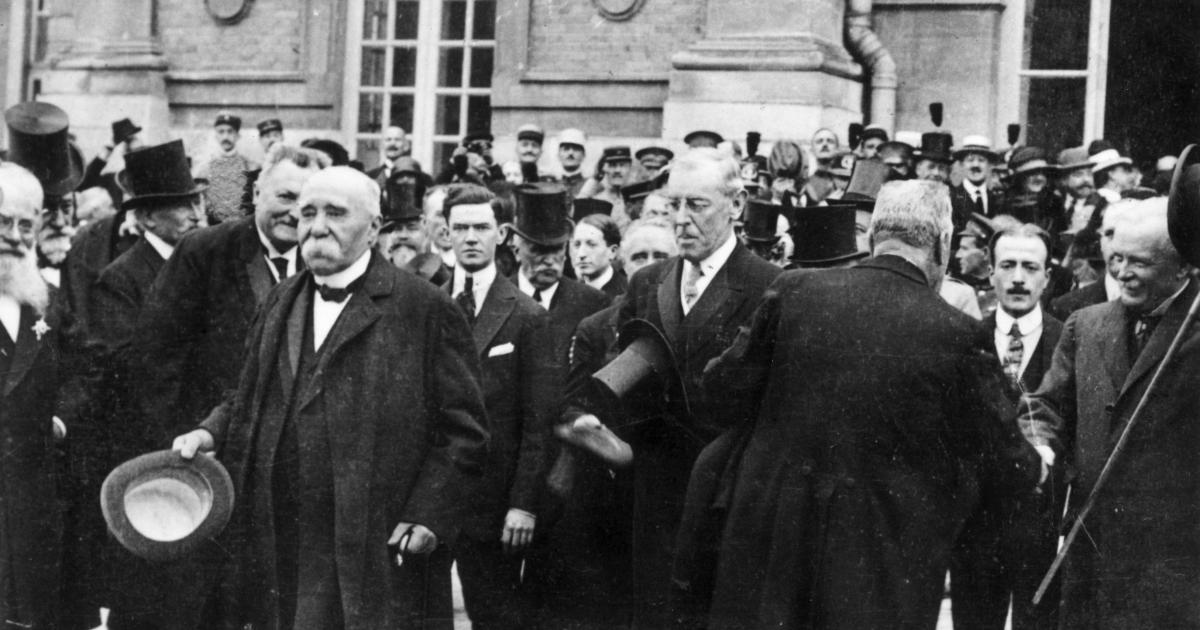 1919: French prime minister Georges Clemenceau (1841 - 1929) (L), US president Woodrow Wilson (1856 - 1924) (C) and British prime minister David Lloyd George (1863 - 1945) attend negotiations for the Treaty of Versailles. (Photo by Hulton Archive/Getty Images)